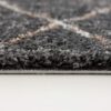Close-up of gray carpet texture and fibers