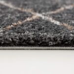 Close-up of gray carpet texture and fibers