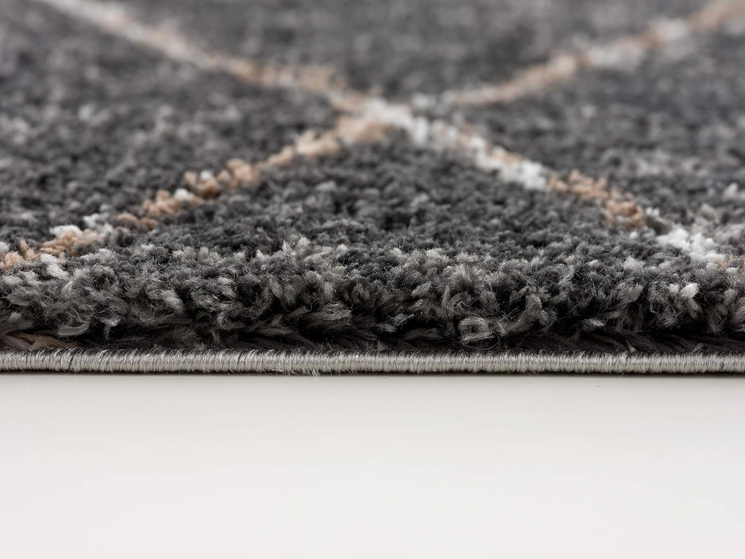 Close-up of gray carpet texture and fibers