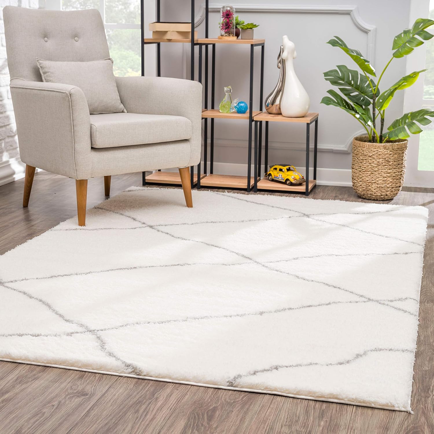 Modern living room with cozy white area rug.