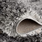 Close-up of gray shaggy rug texture