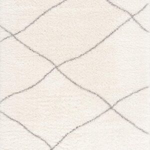 White rug with simple geometric lines.