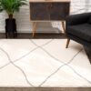 Modern living room with geometric patterned rug.