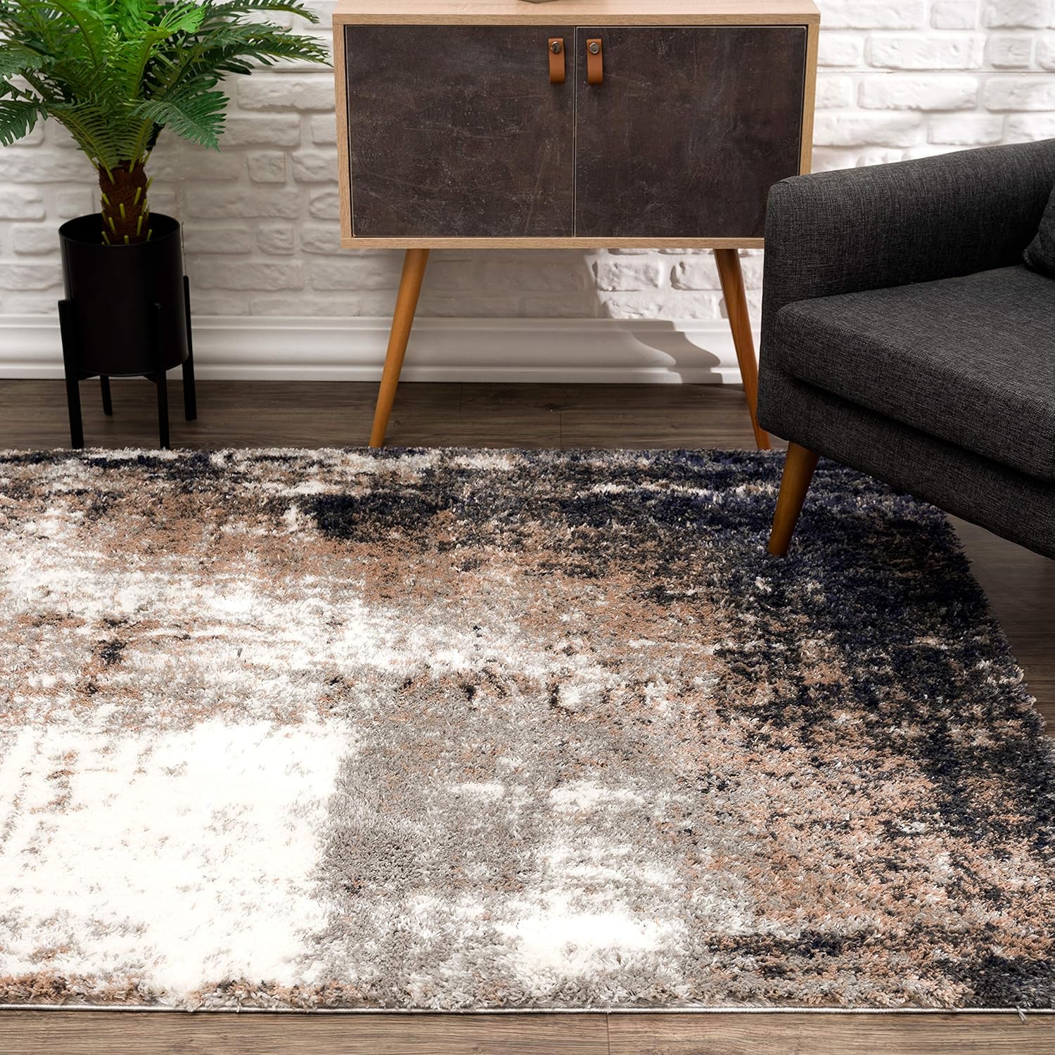 Modern rug in stylish living room interior.