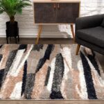 Modern abstract pattern area rug, colorful living room decor.