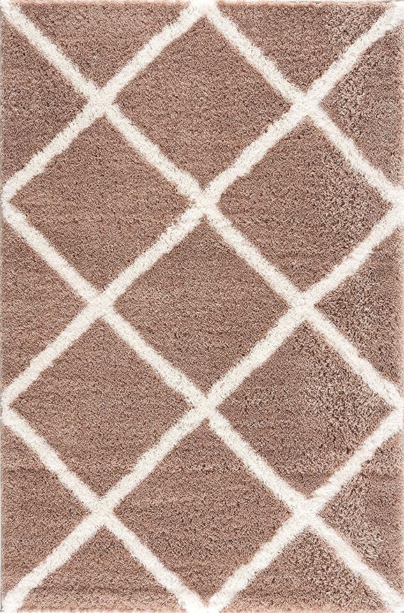 Beige rug with white geometric diamond pattern