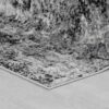 Gray carpet with textured abstract pattern