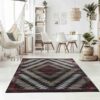 Stylish living room with geometric patterned rug.