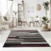 Modern living room with geometric area rug.