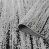 Gray carpet with abstract black pattern.