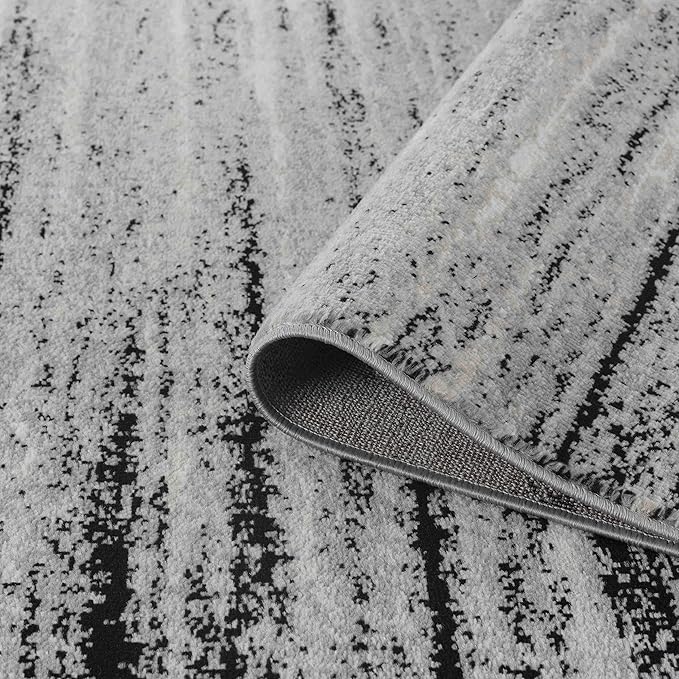 Gray carpet with abstract black pattern.