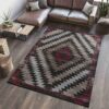 Modern living room with geometric rug.