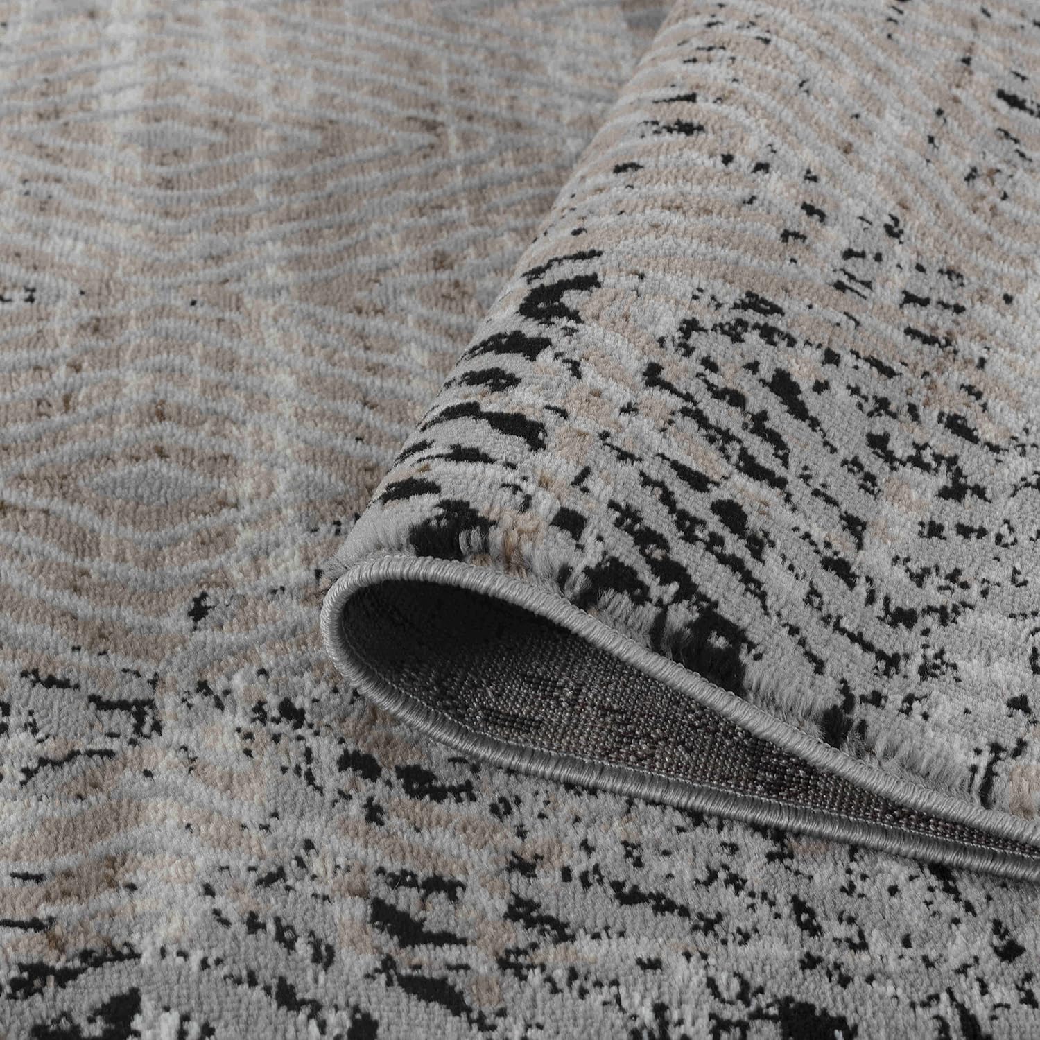 Abstract patterned grey and black carpet texture
