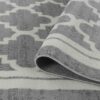 Gray and white patterned area rug