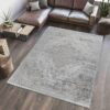 Modern gray rug in stylish living room.