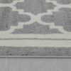 Close-up of gray rug with geometric pattern