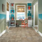 Home office with window, desk, and shelves