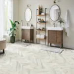 Modern bathroom with double sinks and round mirrors