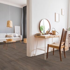 Modern living room and wooden chair at desk.