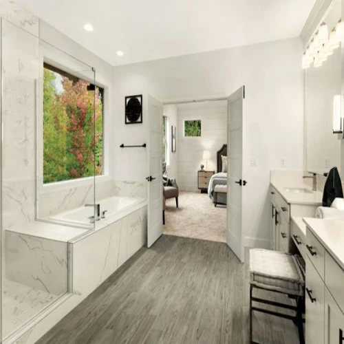 Modern bathroom with large tub and double vanity