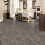 Modern kitchen with gray wood flooring