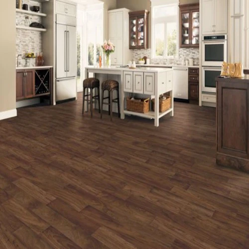 Modern kitchen with dark hardwood flooring