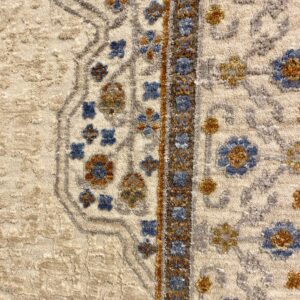 Close-up of floral patterned rug design.