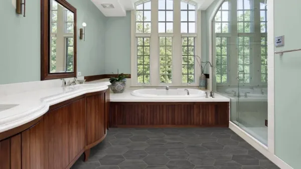 Spacious bathroom with tub and glass shower