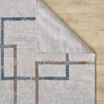 Modern geometric pattern rug on wooden floor