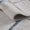 Abstract-pattern silver area rug corner detail