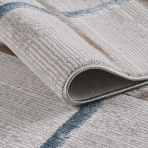 Abstract-pattern silver area rug corner detail