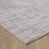 Modern geometric pattern rug on wood floor
