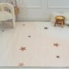 Star-patterned rug in cozy living room setting