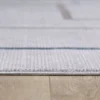 Gray rug on wooden floor close-up