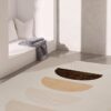 Minimalist room with geometric patterned rug