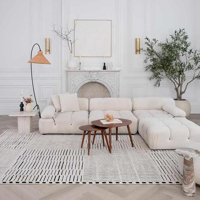 Modern living room with white sectional sofa.