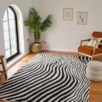 Stylish room with zebra rug and modern decor.