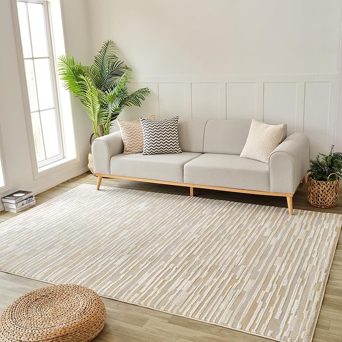 Modern living room with beige rug and sofa.