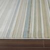 Striped area rug on wooden floor