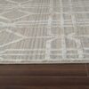 Patterned rug on wooden floor