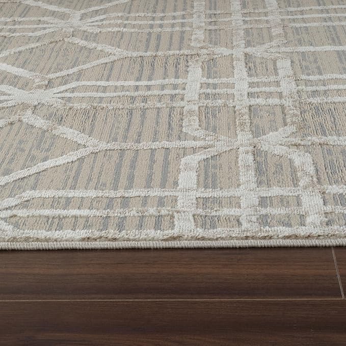 Patterned rug on wooden floor
