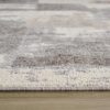 Close-up of textured gray and white area rug.