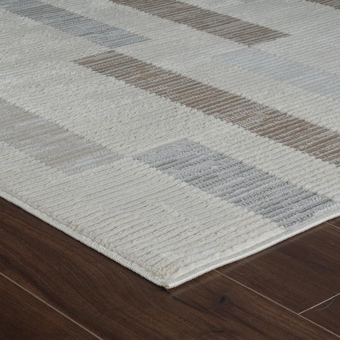 Modern striped rug on wooden floor