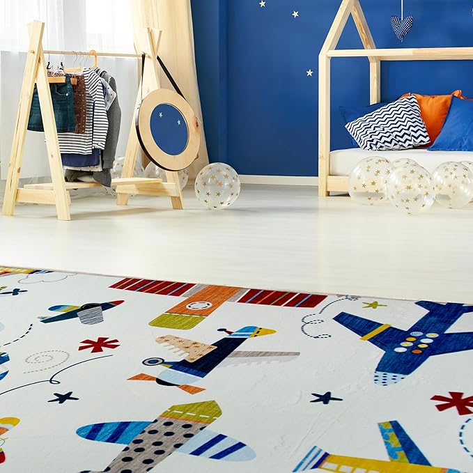 Colorful children's room with airplane-themed carpet