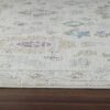 Vintage style area rug on wood floor.