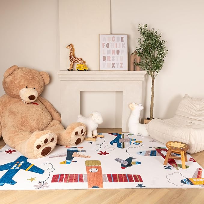 Cozy nursery with toys and colorful airplane rug.