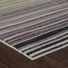 Striped rug on wooden floor