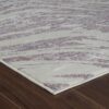 Abstract patterned carpet on wooden floor