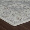Intricate patterned rug on wooden floor