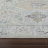 Geometric patterned area rug on wooden floor.